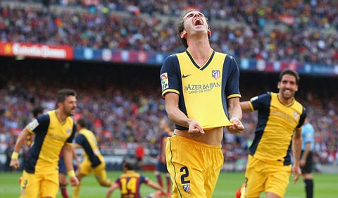 Bàn thắng của Godin vào lưới Barca giúp Atletico vô địch La Liga 2013/14