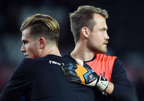 Trong khi De Gea(ảnh trên) khiến các CĐV Man United an tâm thì Liverpool vẫn đau đầu vì Karius và Mignolet (phải)