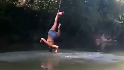 Người đẹp bị treo lộn ngược trên sông vì học làm Tarzan