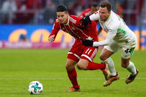 pJames Rodriguez (trái) vừa ghi 1 bàn và có 2 kiến tạo để giúp Bayern vùi dập Dortmund