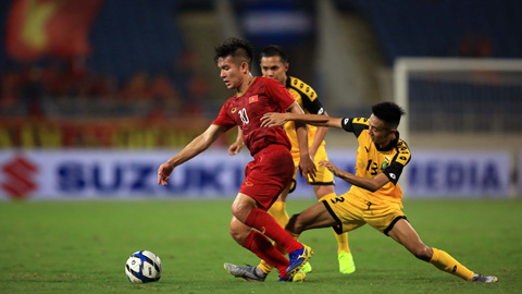 Thái Quý (trái) thi đấu rất ấn tượng trận gặp U23 Brunei 		ẢNH: TUẤN CƯỜNG