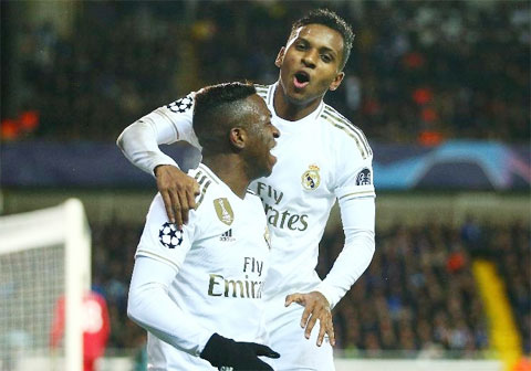 Vinicius (trái) và Rodrygo đều ghi bàn giúp Real đánh bại Club Brugge