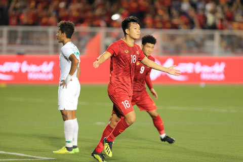 Trung vệ Thành Chung ăn mừng sau khi ghi bàn tại SEA Games 30	ảnh: Đức Cường
