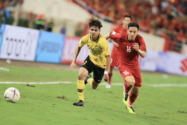 Malaysia (trái) chưa từng thắng ĐT Việt Nam dưới thời HLV Park Hang Seo - Ảnh: MINH TUẤN