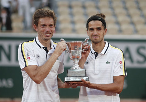 Herbert (phải) đánh cặp với Mahut từ năm 2015 và đoạt nhiều danh hiệu lớn, trong đó có chức vô địch Roland Garros 2021