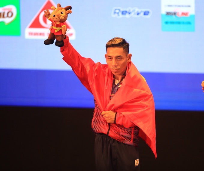 Phạm Văn Mách giành HCV SEA Games sau 15 năm. Ảnh: Minh Tuấn