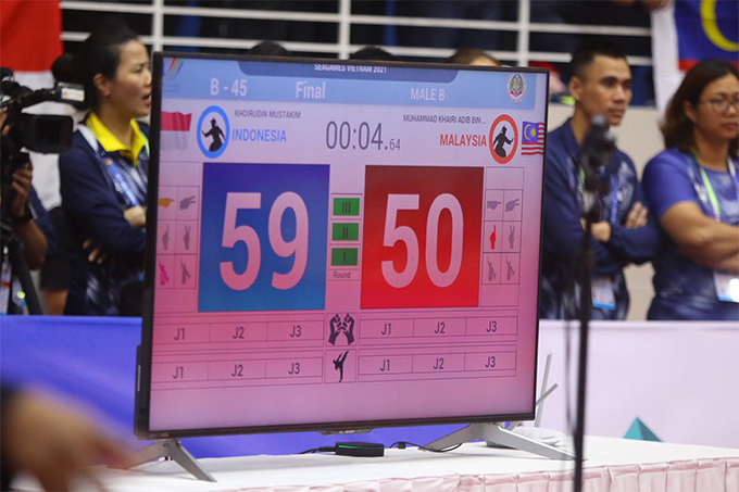 Mustakim bị trừ 10 điểm và thất bại 49-50 trước đối thủ Malaysia và đánh mất tấm HCV.