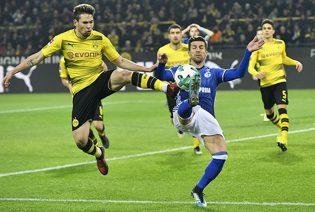 Lực lượng đầy đủ và lợi thế sân nhà sẽ giúp Dortmund (trái) đánh bại Schalke