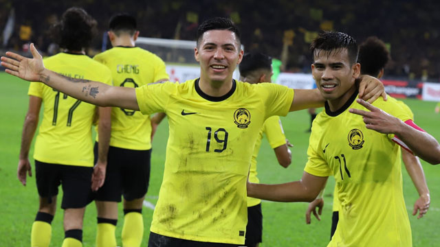 Cầu thủ Malaysia  ăn mừng chiến thắng trước Lào