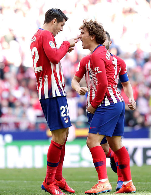 Morata (trái) và đồng đội tự tin hướng tới một chiến thắng trước Sevilla