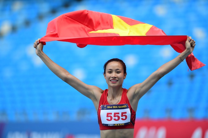 Mỹ Tiên giành HCV 100m rào. Ảnh: Đức Cường 