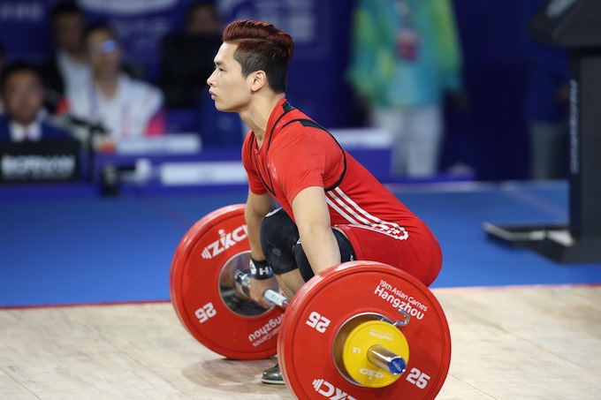 Trịnh Văn Vinh đã thi đấu không thành công ở hạng cân 61kg. ảnh: Bùi Lượng