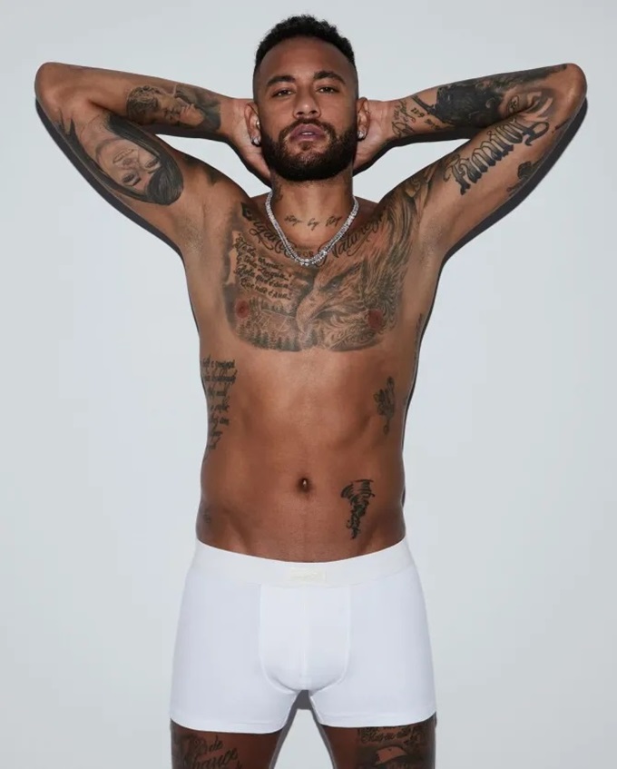 Neymar shows off his tattoo while promoting Kim Kardashian's underwear