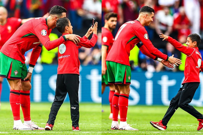 Ronaldo vui vẻ chụp hình cùng fan nhí lao vào sân
