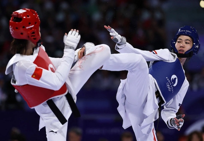 Panipak (giáp xanh) giành HCV cho Thái Lan ở môn taekwondo