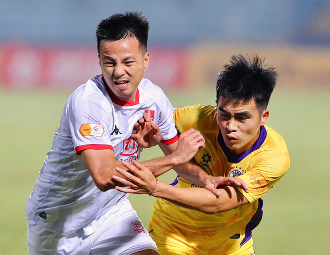 Tính cạnh tranh của V.League sẽ khốc liệt hơn nếu mở rộng suất lên, xuống hạng - Ảnh: Minh Tuấn 