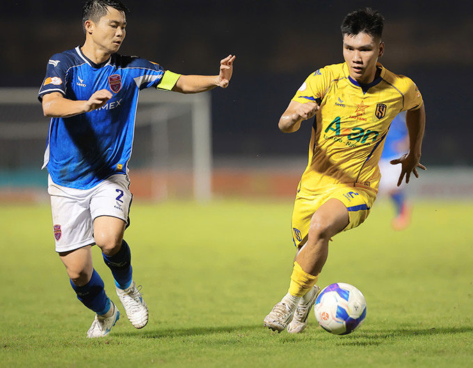 SLNA thắng sát nút Becamex TP.HCM - Ảnh: Đức Cường