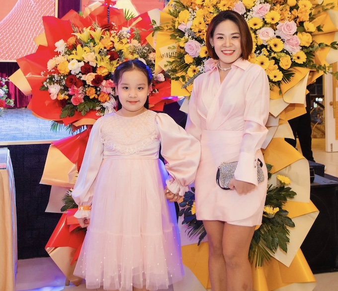 Nhà vô địch Thanh Phúc và cô con gái nhỏ của mình. Ảnh: FBNV