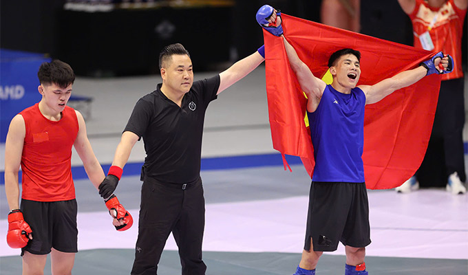 Chiến thắng áp đảo của Quàng Văn Minh trước đối thủ Malaysia - Ảnh: Đức Cường 