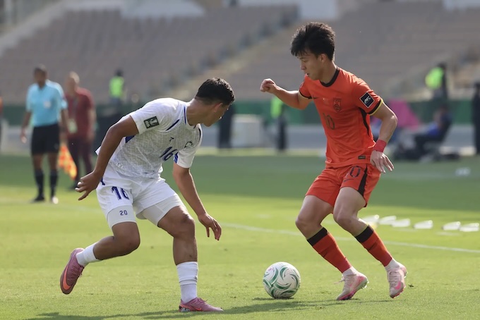 Hàng thủ chắc chắn của U23 Trung Quốc đã khiến Uzbekistan bế tắc trong ghi bàn - Ảnh: AFC