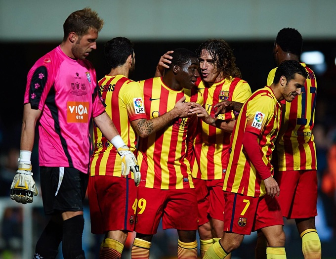 Dondou, đứng giữa, chơi cho Barca tại cúp nhà Vua năm 2013