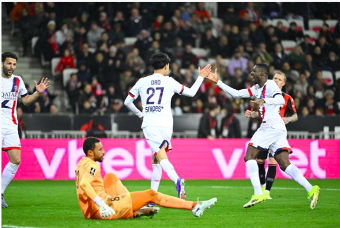 Các cầu thủ PSG ăn mừng bàn thắng vào lưới Nice. Ảnh: F. Faugère/L'Équipe