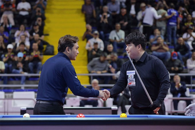 Cho Myung-woo (phải) giành chiến thắng thuyết phục để lên ngôi vô địch