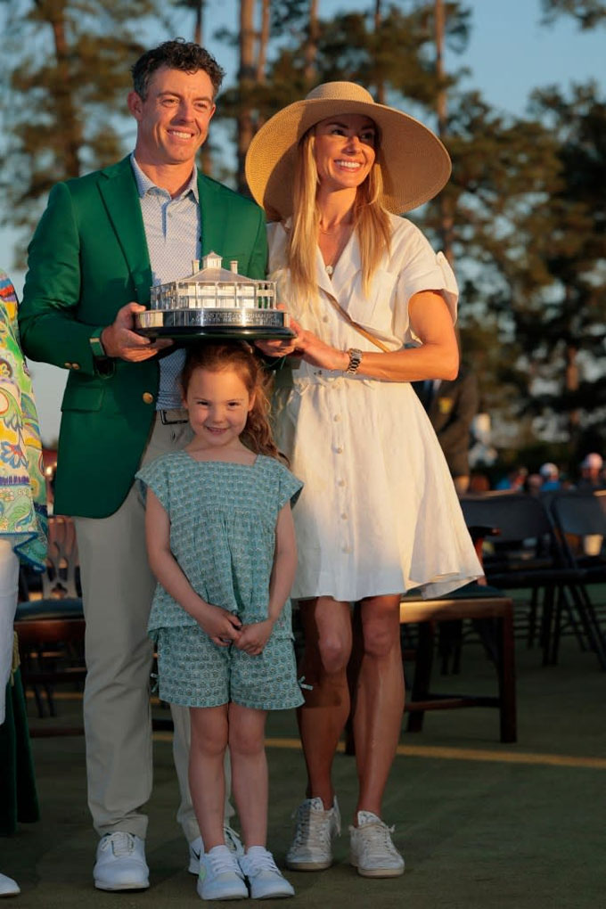 McIlroy bên vợ Erica Stoll và con gái Poppy. Ảnh: Reuters