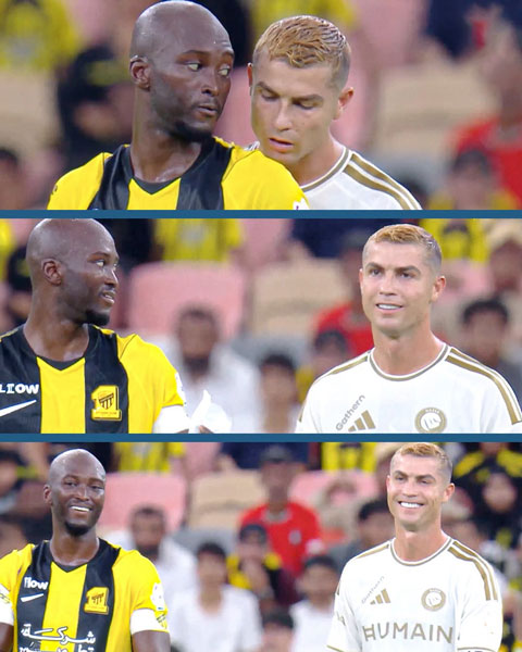 Ronaldo ngó trộm khi Danilo đang đọc mẩu giấy chiến thuật của HLV Al Ittihad - Ảnh: André Marín