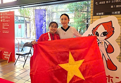 Tuyết Sang (áo trắng) giành HCB taekwondo. Ảnh: Thanh Huy