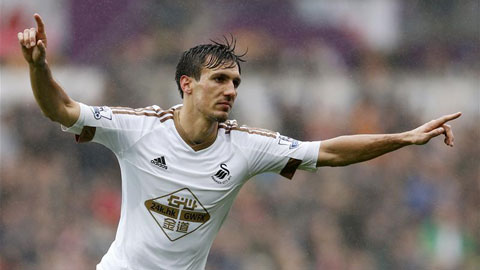 Chủ nhà có bàn gia tăng cách biệt (Swansea City 2-0 Liverpool)