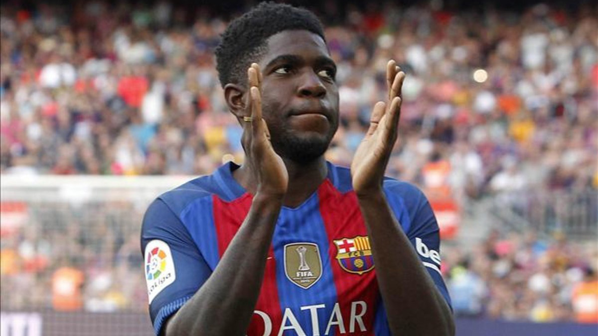 CĐV Real giơ ngón tay thối chế nhạo Umtiti