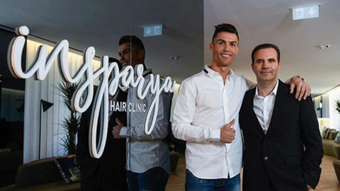 Ronaldo và bạn gái mặc chất lừ về Madrid ra mắt trung tâm cấy tóc