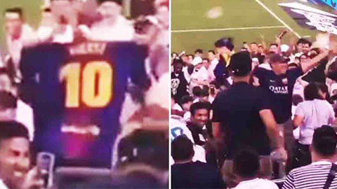 Fan Real nhận gạch đá khi giơ áo Messi suốt trận derby Madrid