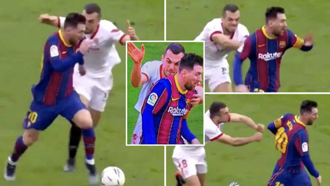 Cầu thủ Sevilla cố gắng kéo áo Messi để ngăn cản anh mà không được