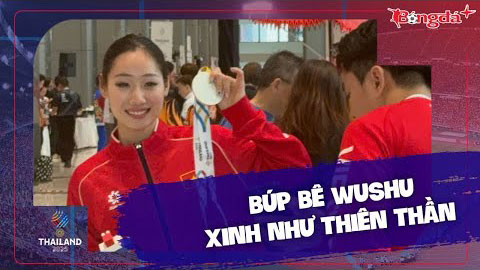 Búp bê wushu Đặng Trần Phương Nhi xinh như thiên thần, tạo dáng bên tấm HCB SEA Games