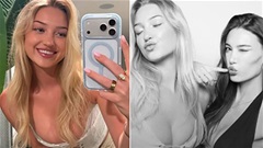 Ring girl xinh đẹp khoe vòng một như thể sắp bung ra khỏi áo